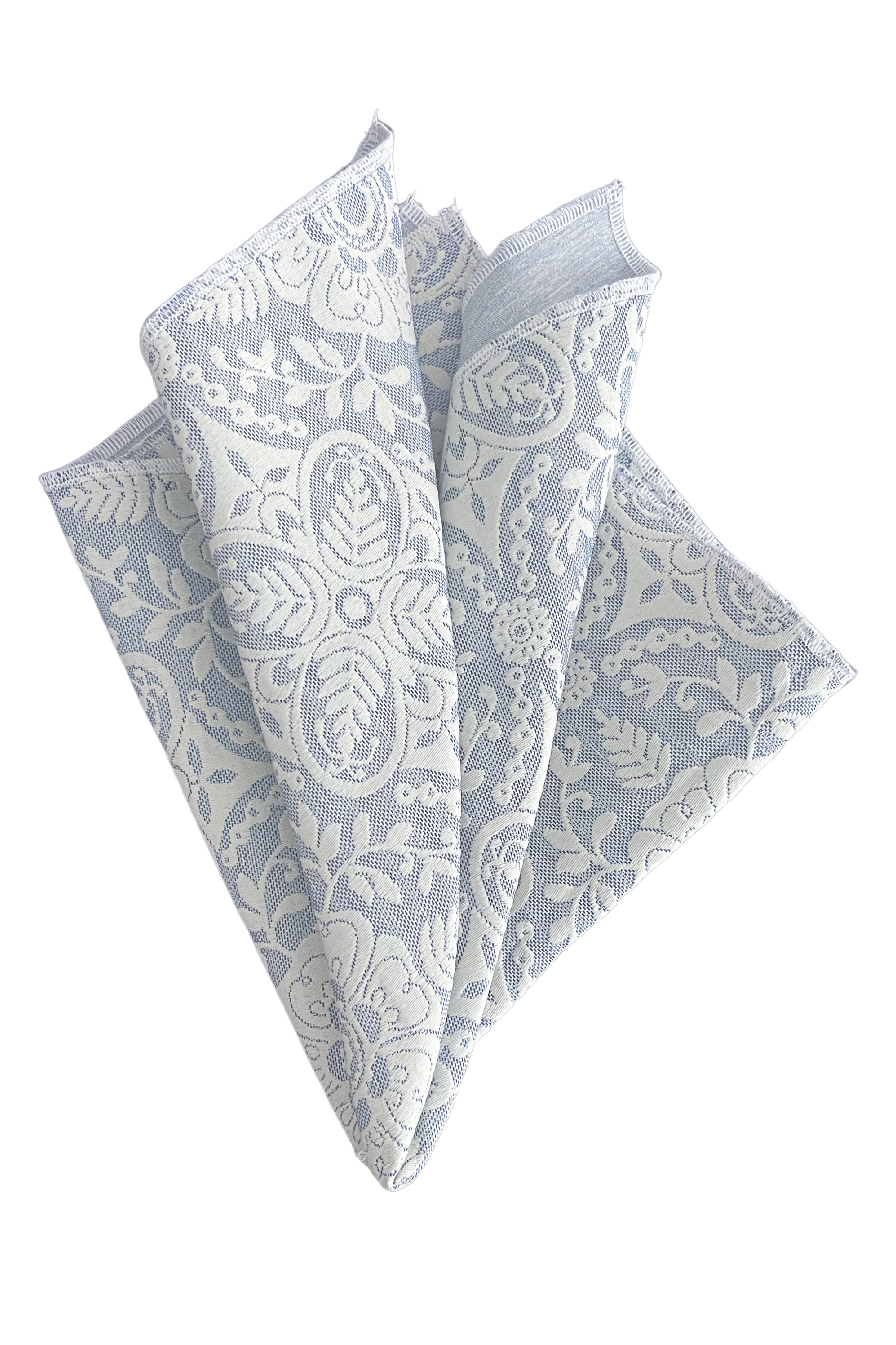 Blue French Floral Napkin with a floral tile pattern reversible with a solid blue on the reverse side